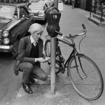Andy Warhol Locking His Bike